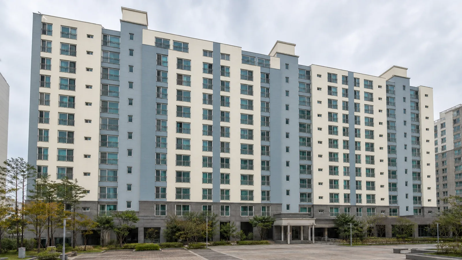 A completed light-grey Korean apartment exterior option